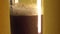Brown foaming drink kvass or beer in a glass, vials of foam burst