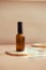 Brown glass cosmetic bottle on minimalist background