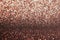 Brown glitter vintage lights background, defocused light