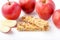 Brown granola bars on red apples background