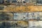 brown-gray background from the texture wall of an ancient building made of stone slabs in the Gothic style