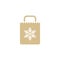 Brown grocery paper shopping paper bag with snowflake and wings. flat icon isolated on white
