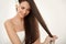 Brown Hair. Beautiful Brunette with Long Hair. Haircare. Spa Beauty Model