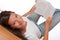 Brown hair teenager lying on wooden floor