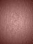 A brown image of a specific texture for the background.lighted, almost mirrored surface.