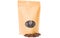 Brown kraft paper doypack stand up pouch with oval window zipper filled with coffee beans on white background