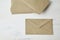 Brown kraft paper post envelope on wooden table