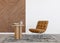 Brown leather armchair in contemporary interior. Modern, stylish, high quality leather furniture. Natural material. 3D
