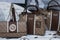 Brown leather hand bags collection by Guess in a luxury fashion store showroom