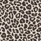 Brown leopard or jaguar seamless pattern. Modern animal fabric design. Vector illustration background.