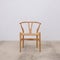 brown living room and patio chairs with rattan seat and wood backrest in retro style