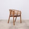 brown living room and patio chairs with rattan seat and wood backrest in retro style