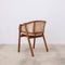 brown living room and patio chairs with rattan seat and wood backrest in retro style