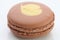 Brown macaroon on white background