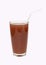 Brown mangosteen juice in tall glass with straw isolated on white background.