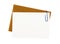 Brown manila envelope with blank note card or business invitation