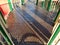 Brown metal floor with holes on play structure at playground