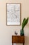 Brown mock up poster frame with map in stylish, Scandinavin living room interiior.