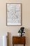 Brown mock up poster frame with map in stylish, Scandinavin living room interiior.