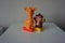 Brown monkey and orange giraffe toys for children