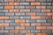Brown mottled decorative brick wall for background