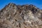 Brown mountain with snow on the top and yellow stone ground at Thangu and Chopta valley in winter in Lachen. North Sikkim, India