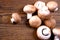 Brown mushroom on wood background