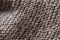 Brown natural woolen fabric, background texture