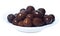 Brown olives in bowl isolated