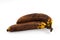 Brown overripe bananas on white background