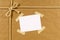 Brown paper package background, address label, sticky tape