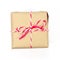 Brown paper parcel tied with red and white string