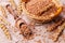 Brown peeled wheat grits on a textile background