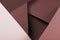 Brown and pink color corrugated paper texture. Geometric shapes and lines.