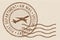 Brown postmark on beige background