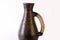 Brown pottery pitcher