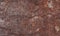 Brown and red background with concrete texture horizontal top view isolated, vintage dark bronze backdrop, old rustic stone board