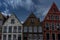 Brown, red and white Rooftop with gable and steps on the houses at Brugge, Belgium, Europe