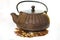 Brown ribbed cast iron teapot