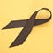 Brown Ribbon on Vibrant Yellow