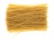 Brown rice pasta fettuccini on a white background