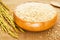 Brown rice in wooden bowl