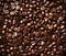 Brown roasted coffee beans background, arabica coffee beans close up