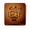 Brown Robot burned out icon isolated on white background. Wooden square button. Vector