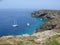 Brown rocks with boats in Pantelleria