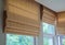 Brown roman blind shade curtain tree forest mountain background living room