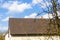 Brown roof with chimney and Lightning conductor