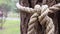 A brown rope knotted securely to a sturdy tree trunk. Close-up of the knot. Rope around the tree trunk. Wonderful natural