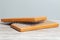 Brown Sadhu wooden boards with nails for yoga and spiritual practices on the grey background