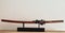 Brown samurai katana sword on a stand